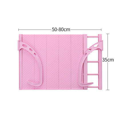 Suszarka do ubrań wisząca na parapecie